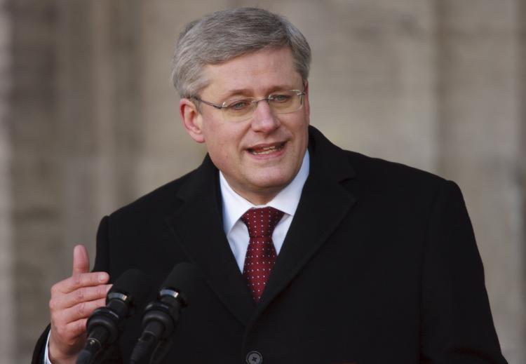 Canadian Prime Minister Stephen Harper speaks at Rideau Hall in Ottawa on March 26, following a meeting with Governor General David Johnston to dissolve the Parliament so there can be an election. Canadians will head to the polls in a federal election on May 2. (Geoff Robins/AFP/Getty Images)