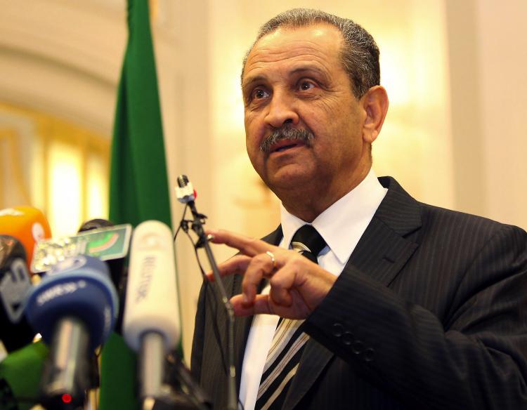 Libyan Oil Minister Shukri Ghanem speaks during a press conference in Tripoli on March 19. Ghanem apparently defected from the country, according to reports on Tuesday.  (mahmud Turkia/Getty Images )