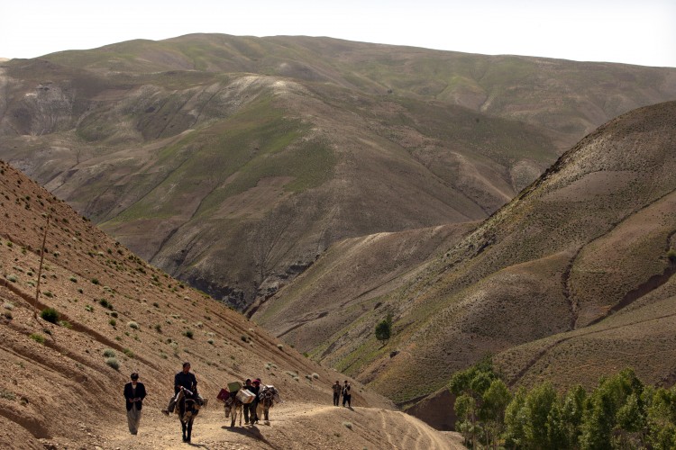 Dr. Jaghori and his team had to carry everything in by foot and donkey. The team saw 160 patients during the monthly visit to the village where people came from ten outlying villages as well.  (Paula Bronstein/Getty Images)