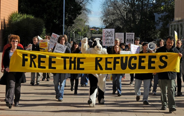 Protesters march towards a theatre where Immigration Minister Chris Bowen was delivering a speech on the government's refugee program at the University of NSW, in Sydney, on June 17, 2011. (Torsten  Blackwood/AFP/Getty Images)