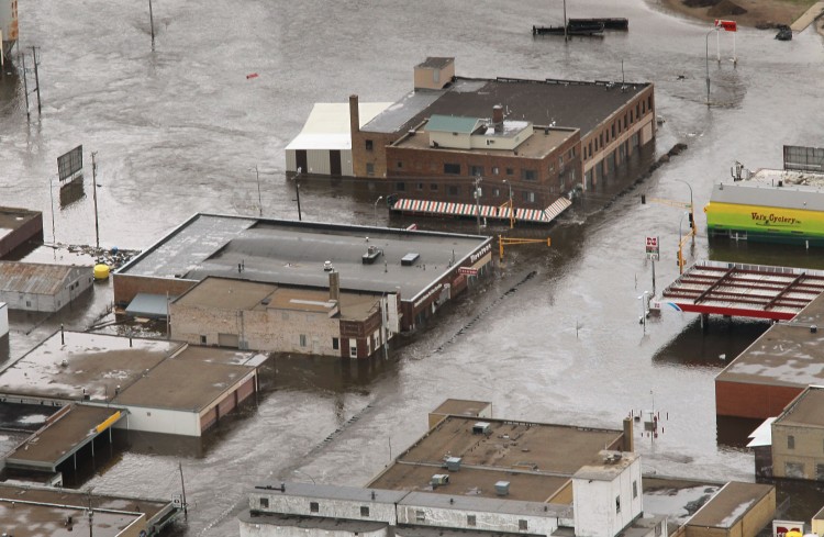 Businesses are surrounded by floodwater as the Souris River crests as seen from the air June 26, 2011 in Minot, North Dakota.  (Scott Olson/Getty Images)