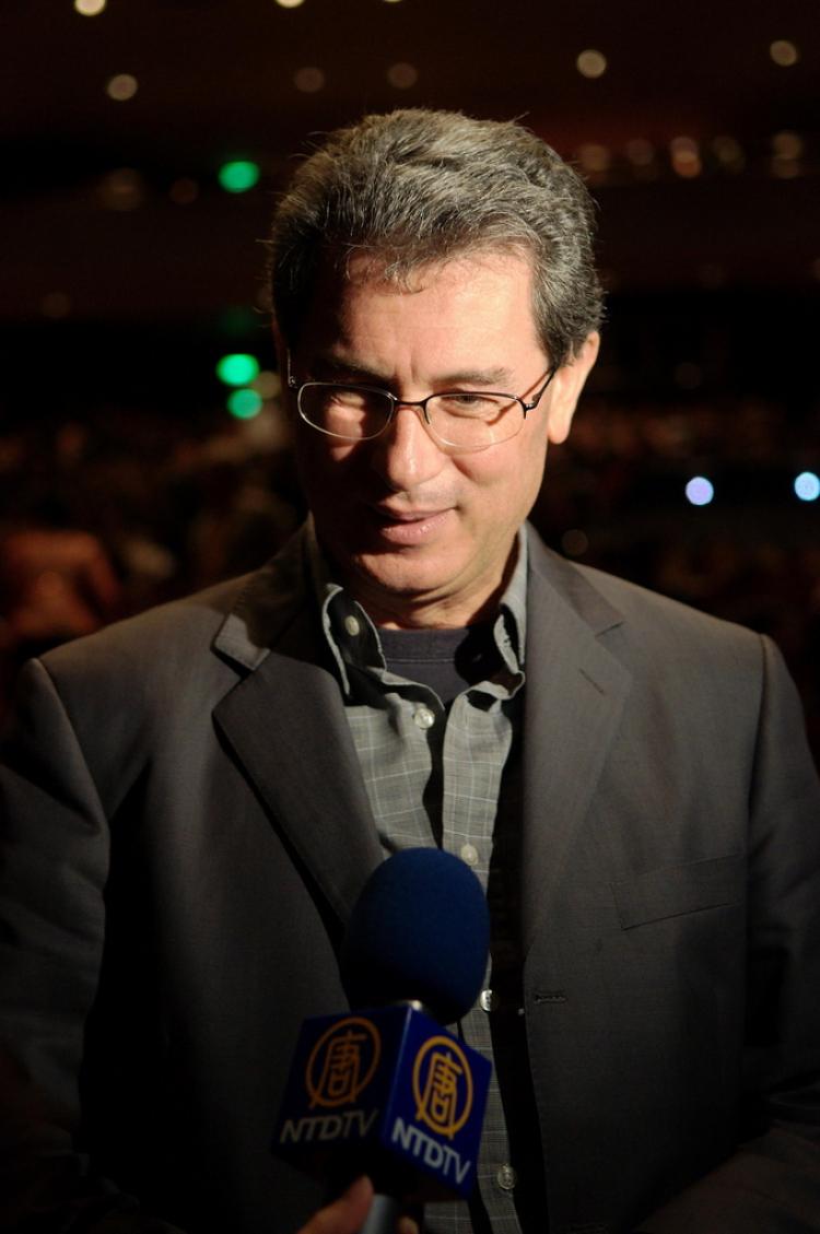 Mr. Mario Palma contemplating his feelings during intermission at the Taipei International Convention Centre, Mar. 2, 2009. (Li Yuan/The Epoch Times)