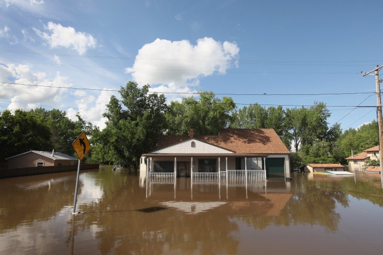 A home is surrounded by floodwater June 26, 2011 in Burlington, North Dakota. (Scott Olson/Getty Images)