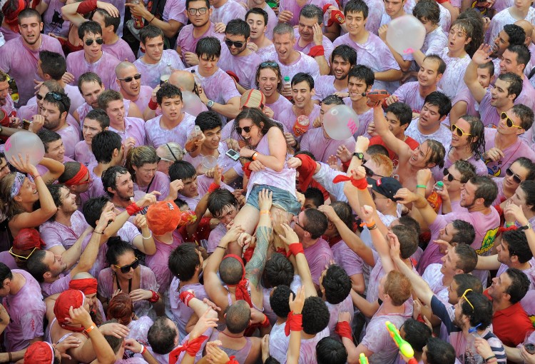 Revellers celebrate during the Chupinazo festival. (Dennis Doyle/Getty Images)