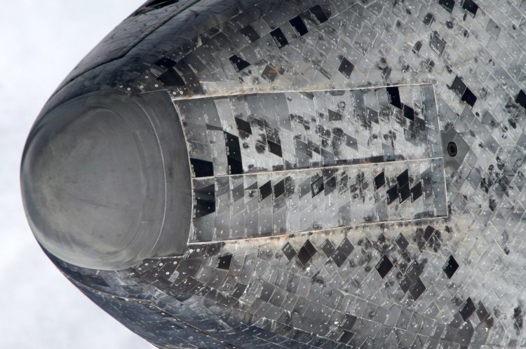 The nose of NASA space shuttle Atlantis in Earth orbit is seen during a Rendezvous Pitch Maneuver. (NASA via Getty Images)