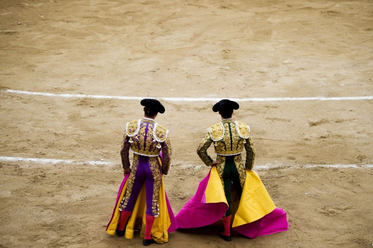 Bullfighters Jose Manzanares (L) and Julian Lopez 'El Juli' look on. (David Ramos/Getty Images)