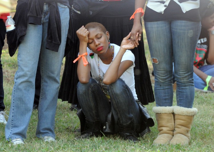 A demonstrator pauses while calling for Georgia state officials to halt the scheduled execution of convicted cop killer Troy Davis. Davis was eventually executed on Wednesday night.  (Erik S. Lesser/AFP/Getty Images)