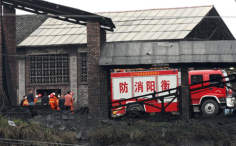 Chinese mining rescue team members prepare to enter the state-owned Xialiuchong Coal Mine, after an explosion in Hengyang city, central China's Hunan province on October 30. A gas explosion at the coal mine which was operating without a proper license has killed 29 miners, state media said October 29, the latest in a series of deadly accidents to hit the industry. (STR/AFP/Getty Images)