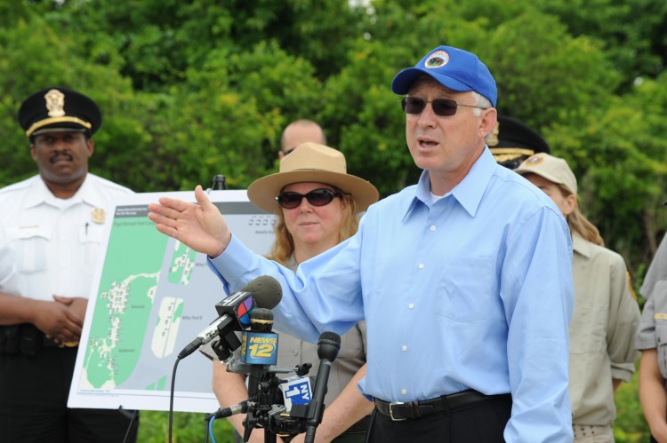 GREAT OUTDOORS: U.S. Interior Secretary Ken Salazar presents his Great Urban Parks plan with members of the National Park Service at Floyd Bennett Field in Brooklyn on Monday. (Courtesy of Tami Heilemann)