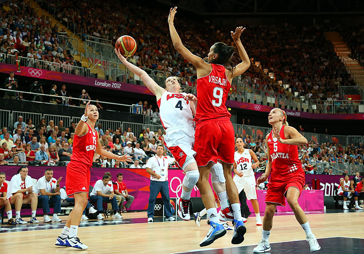 Lindsay Whalen #4 of United States attempts a shot against Marija Vrsaljko #9 of Croatia during Women's Basketball on Day 1 of the London 2012 Olympic Games at the Basketball Arena. (Christian Petersen/Getty Images)