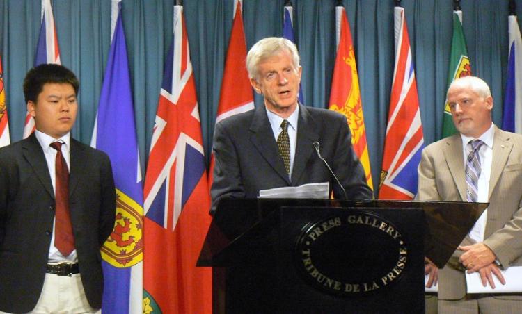 DECADE OF PERSECUTION: (L-R) Falun Gong practitioner Shen Yu, former MP Hon. David Kilgour, and Amnesty International Secretary General Alex Neve spoke at a press conference on Canada's Parliament Hill to mark ten years of perscution of Falun Gong in China. (Donna He/The Epoch Times)