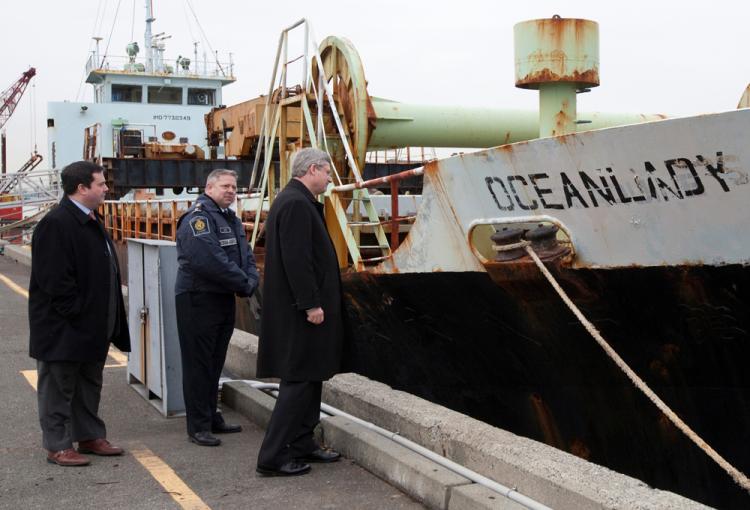 Prime Minister Stephen Harper and Immigration Minister Jason Kenney get a tour of the MV Ocean Lady by Ivan Peterson with the Canadian Border Services Agency on Feb. 21. The ship is an example of human smuggling activities that target Canada, says Kenney. (PMO photo by Jason Ransom)