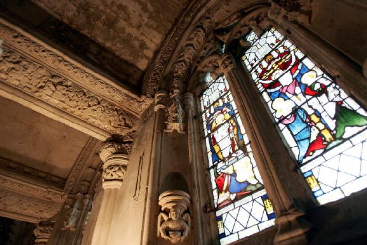 Intricate carvings and stained glass windows of Rosslyn Chapel are pictured on April 22, 2005 in Roslin, Scotland. (Christopher Furlong/Getty Images)