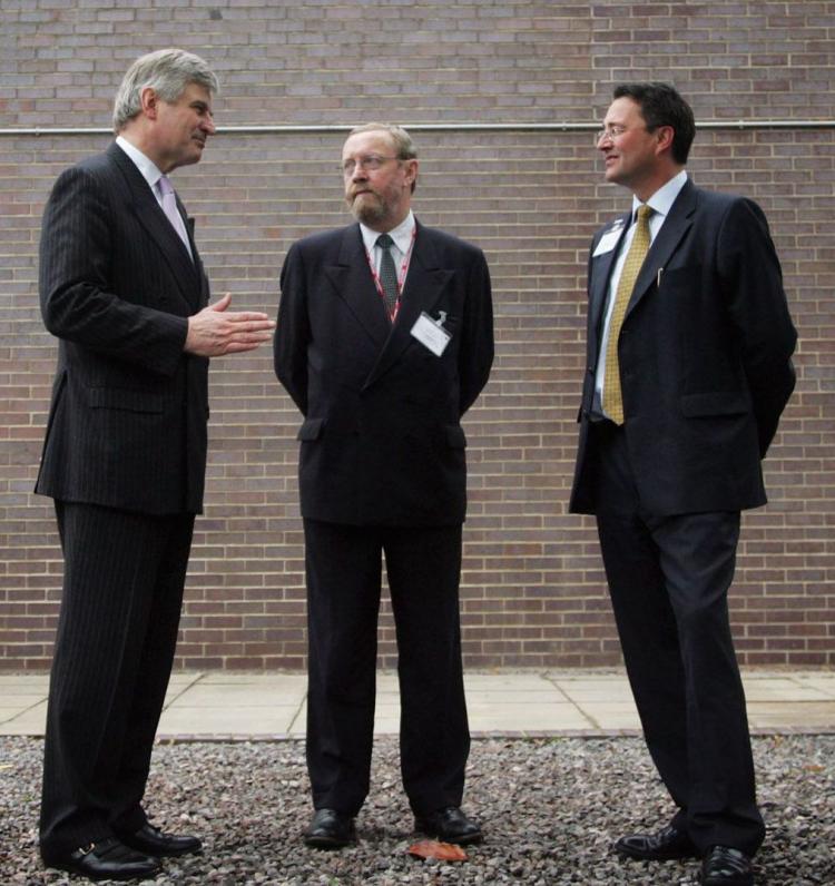 Britain's chief scientific adviser Professor John Beddington (center) says climate researchers must be more honest and open about the uncertainties surrounding climate change. (Matt Cardy/Getty Images)