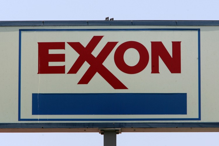 A sign advertises an Exxon gas station as the cost of southern California.On July 1, a pipeline from ExxonMobil burst and crude oil spilled into the Yellowstone River around 20 miles upstream from Billings, Mont. (David McNew/Getty Images)