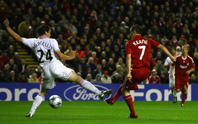 FIRST GOAL: Robbie Keane slides a shot that would end up just inside the far post for his first goal in the famous red shirt of Liverpool.  (Alex Livesey/Getty Images)