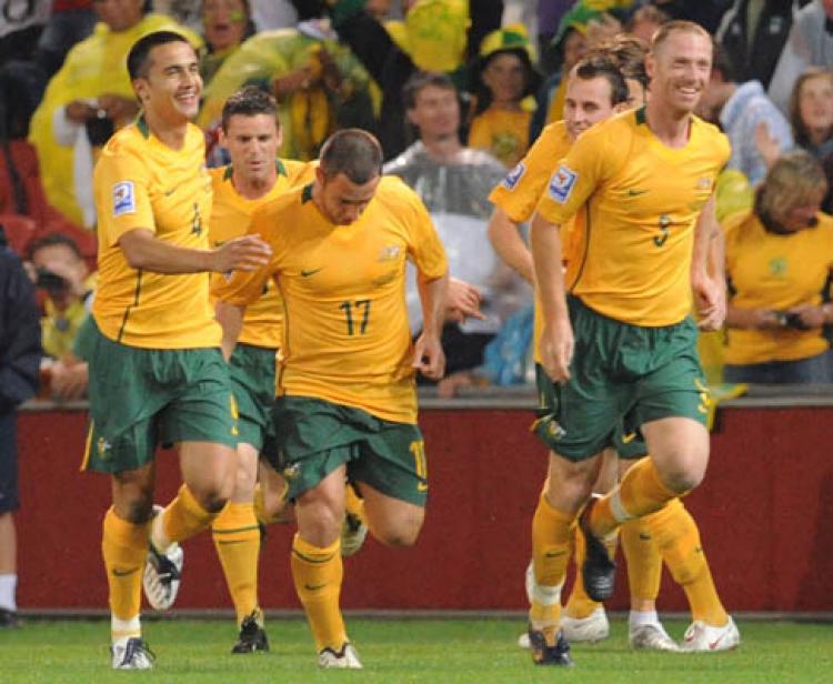The Socceroos celebrate a goal by Tim Cahill during the 2010 FIFA World Cup qualifier match against Qatar. (David Hardenberg/Getty Images)