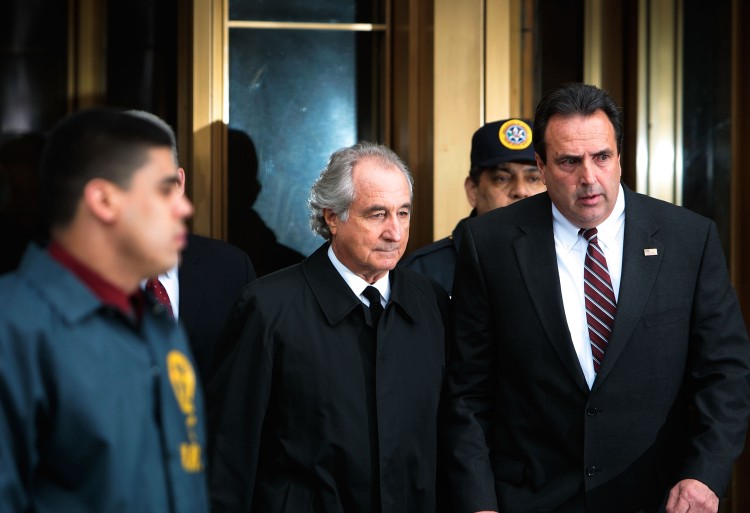 Financier Bernard Madoff leaves Manhattan Federal court March 10, 2009 in New York City. During a '60 Minutes' episode, which aired on Oct. 30, both Ruth and Andrew Madoff reiterated their lack of knowledge of Bernard's involvement in the Ponzi scheme. (Chris Hondros/Getty Images)