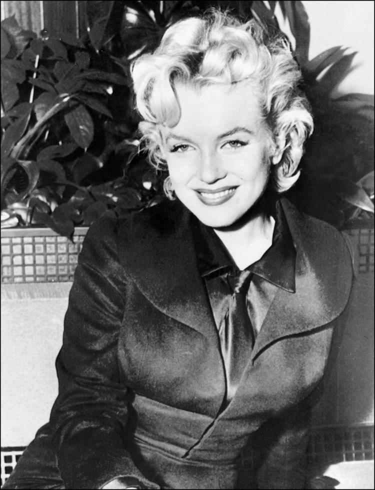Marilyn Monroe file photo. The beginnings of the new movie 'My Week with Marilyn,' was redecorated into a 1950s style in order to capture Marilyn Monroe's arrival at Heathrow Airport in 1956.(STR/AFP/Getty Images)