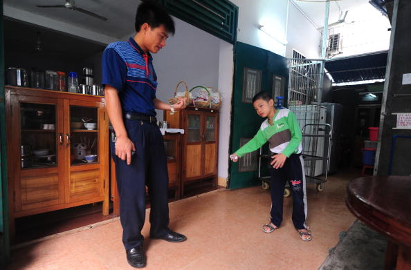 Huang Zhuoxiang, who suffers from cerebral palsy