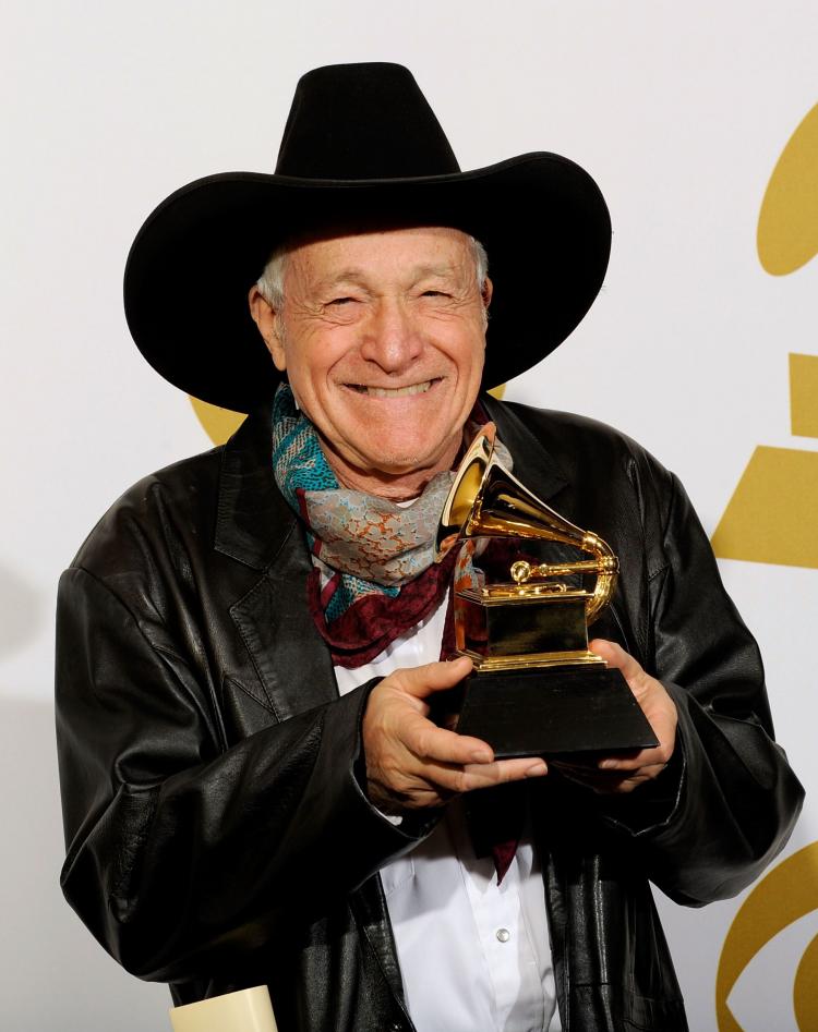 Ramblin' Jack Elliott poses with his Best Traditional Album award for 'Stranger Here' during the 52nd Annual Grammy Awards on January 31 in Los Angeles. (Kevork Djansezian/Getty Images)