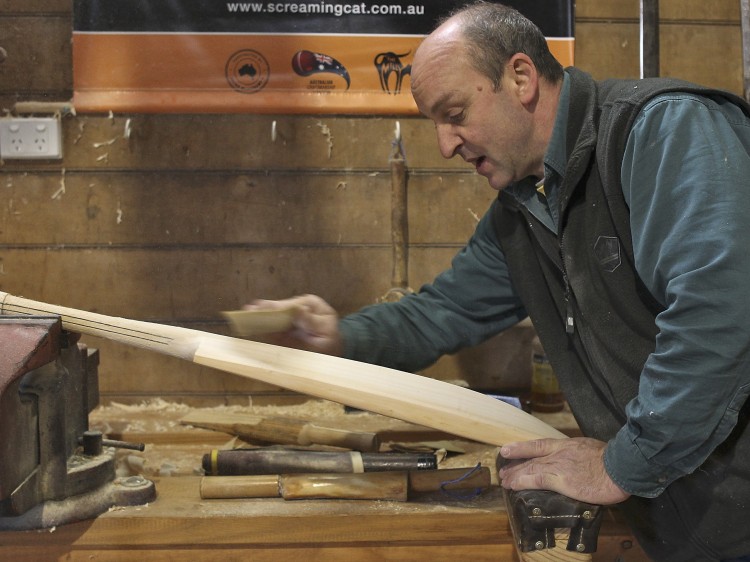 Craftsman Julian Milichamp sands a cricket bat