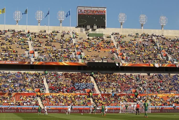 One fourth of the seats were left unfilled during the Algeria vs. Slovenia World Cup game in Polokwane. FIFA is investigating why the sold seats remained empty.  (Cameron Spencer/Getty Images)