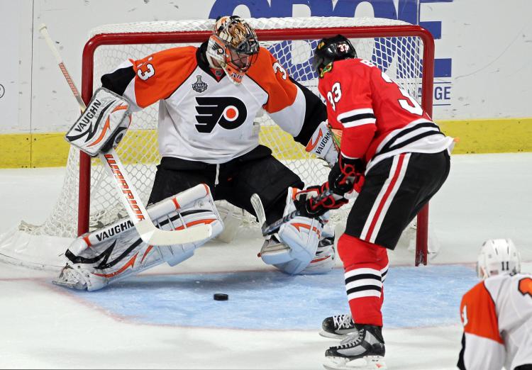 Chicago's big man Dustin Byfuglien scored his team's fifth goal. (Andre Ringuette/Getty Images)