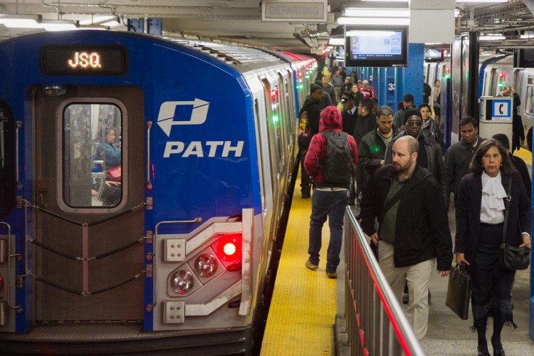 Commuters exit the Path Train at the 34th Street subway on March 15, 2012 in Manhattan. (Benjamin Chasteen/The Epoch Times)