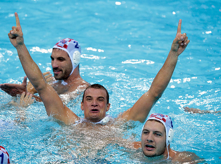 The Croatian water polo team celebrates winning gold against Italy on Day 16 of the London 2012 Olympic Games. (Adam Pretty/Getty Images) 