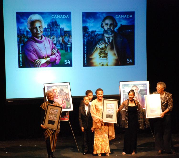 (L-R) Cleta Brown Surji, daughter of Rosemary Brown; Dr. Mary Regester, president of the National Congress of Black Women Foundation; Jackie Bailey, operations manager of Canada Post, and Joyce Shadd Middleton, great great granddaughter of Abraham Doras S (Helena Zhu/The Epoch Times)