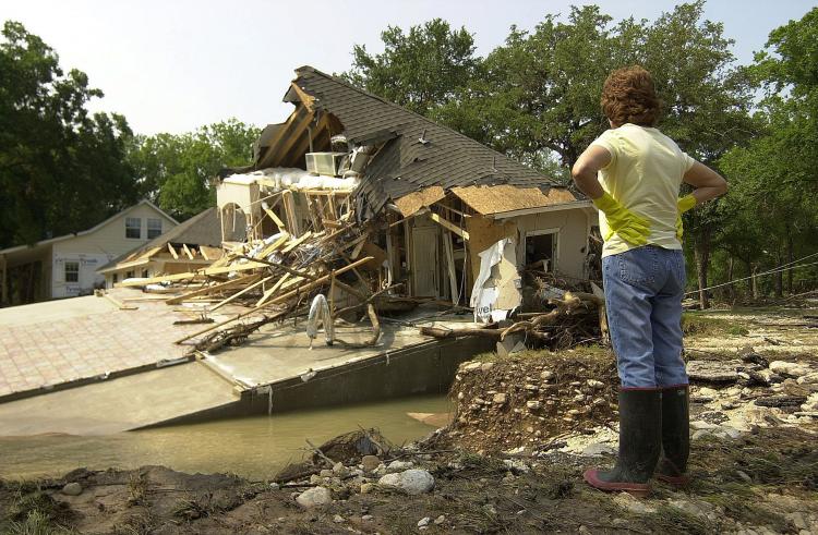 A house, which was ripped apart by floods on July 8, 2002 in New Braunfels, Texas. New Braunfels, was once again the target of a severe flooding that struck last Wednesday, killing one. (Alicia Wagner Calzada/Getty Images)