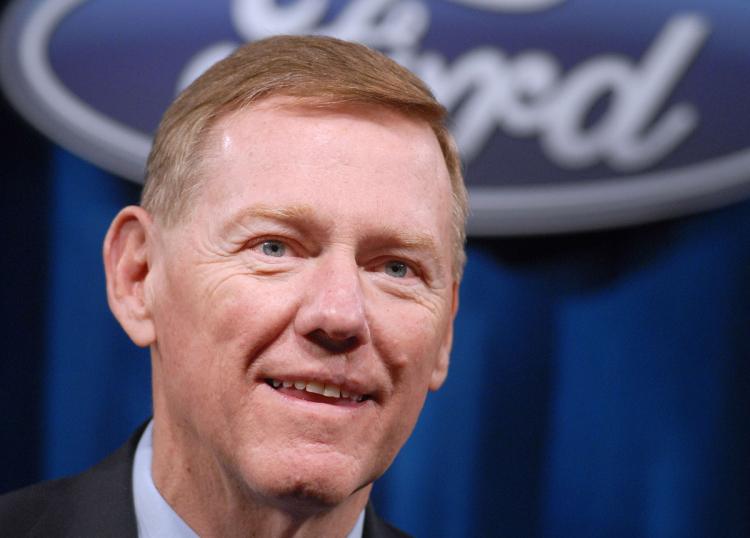 CONFIDENT: Chief Executive Officer of Ford Motor Company Alan Mulally is all smiles as he speaks with the media at the Ford Annual Shareholder Meeting on May 13. Ford last Friday posted quarterly profits of $2.6 billion, exceeding expectations. (William Thomas Cain/Getty Images)