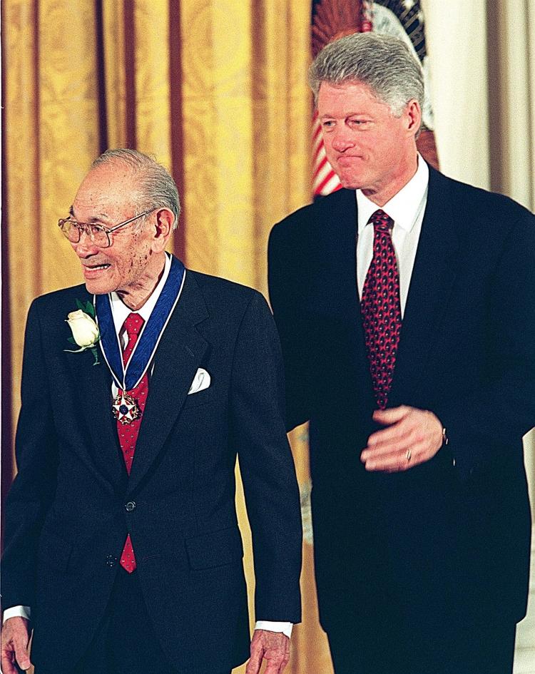 Former President Bill Clinton (R) stands with Fred Korematsu after awarding him the Presidential Medal of Freedom, the nation's highest civilian honor, Jan. 15, 1998 during ceremonies at the White House in Washington. (Paul J. Richards/AFP/Getty Images)