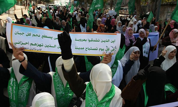 Palestinian student supporters of the Islamist movement Hamas shout slogans as they march in Gaza City on March 2, during a rally against an Israeli plan to renovate two deeply contested holy sites in the occupied West Bank. (Mahmud Hams/AFP/Getty Images)