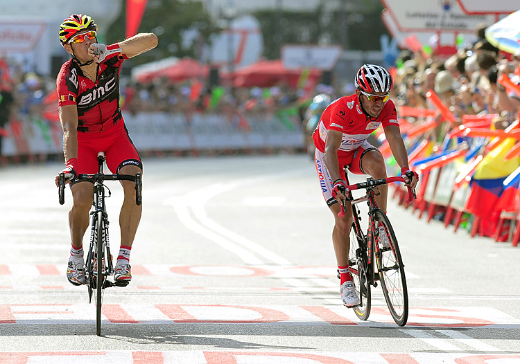 BMC's Philippe Gilbert (L) crosses the finish line just ahead of race leader Joaquin Rodriguez of Katusha in Stage Nine of the 2012 Vuelta a España. (Lluis Gene/AFP/GettyImages)