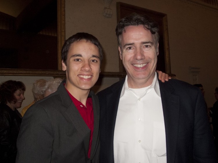 Mr. Harty and his son enjoy Shen Yun Performing Arts at the SHN Orpheum Theatre in San Francisco on March 22. (Alex Ma/The Epoch Times)