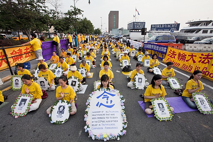 In front of the Chinese consulate in New York City, Falun Gong practitioners mark 12 years of persecution at the hands of the Chinese communist regime in China. (Amal Chen/The Epoch Times)