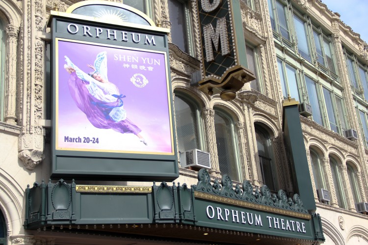 A billboard displaying the upcoming Shen Yun Performing Arts at the SHN Orpheum Theatr