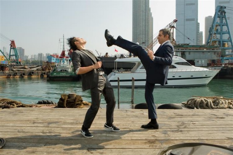 (L-R) Williams Belle, as an assassin, receives a blow from the spy agent Johnny English, played by Rowan Atkinson, in the adventure-comedy-thriller, 'Johnny English Reborn.'