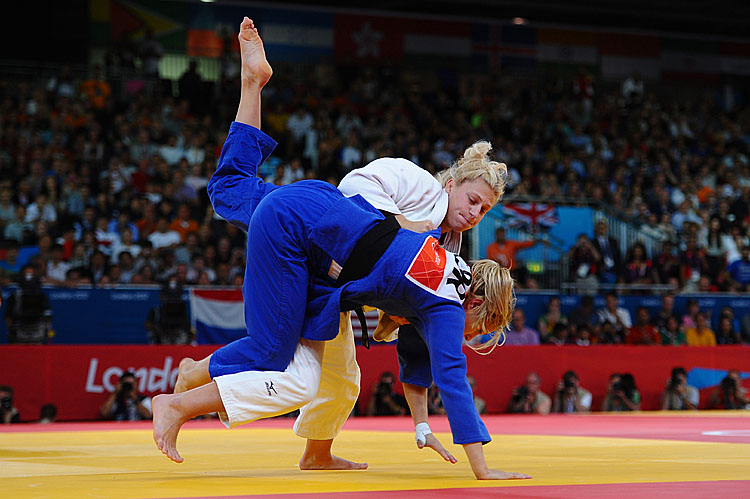 Kayla Harrison of the United States (white) and Gemma Gibbons of Great Britain compete in the Women's 78-kg Judo on Day 6 of the London 2012 Olympic Games. (Laurence Griffiths/Getty Images)