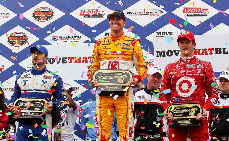 WHO REALLY WON? (L-R) Second place Oriol Servia, winner Ryan Hunter-Reay, and third place Scott Dixon share the podium after the MoveThatBlock.com Indy 225 at New Hampshire Motor Speedway. After the appeal these positions may be altered—but not it's not likely (Nick Laham/Getty Images)