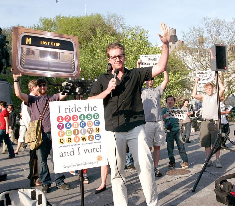 ENOUGH! Executive Director of Transportation Alternatives Paul Steely White speaking at Union Square Park on Tuesday. Hundreds turned out for a rally against upcoming MTA service cuts and fare hikes, rally-goers have turned their attention to Albany, dema (Tim McDevitt/The Epoch Times)