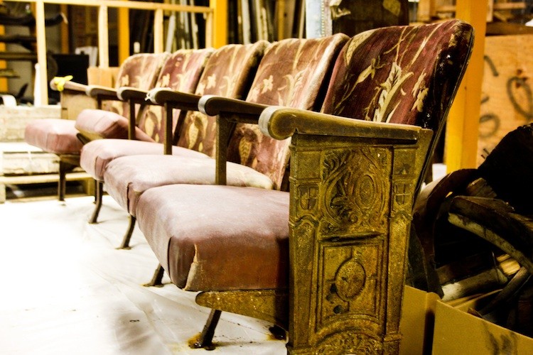 Century-old movie theater seats from the theater that once occupied the building that is now the Autobahn Ballroom in northern Manhattan. (Tara MacIsaac/The Epoch Times)