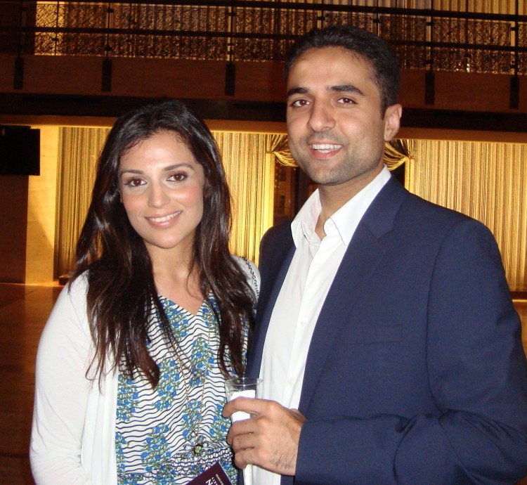 Solomon Masimy, a dentist originally from Afghanistan, with his girlfriend at the New York-based Shen  Yun Performing Arts at the Lincoln Center's David H. Koch Theater on  June 24. (The Epoch Times)