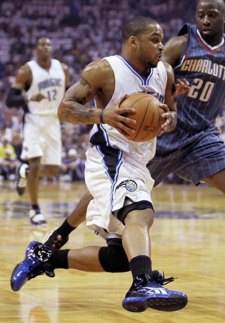 Guard Jameer Nelson led the Orlando Magic with 32 points in a 98-89 win over the Charlotte Bobcats in Game 1 of the NBA Eastern Conference Quarterfinals on Sunday. (Doug Benc/Getty Images )