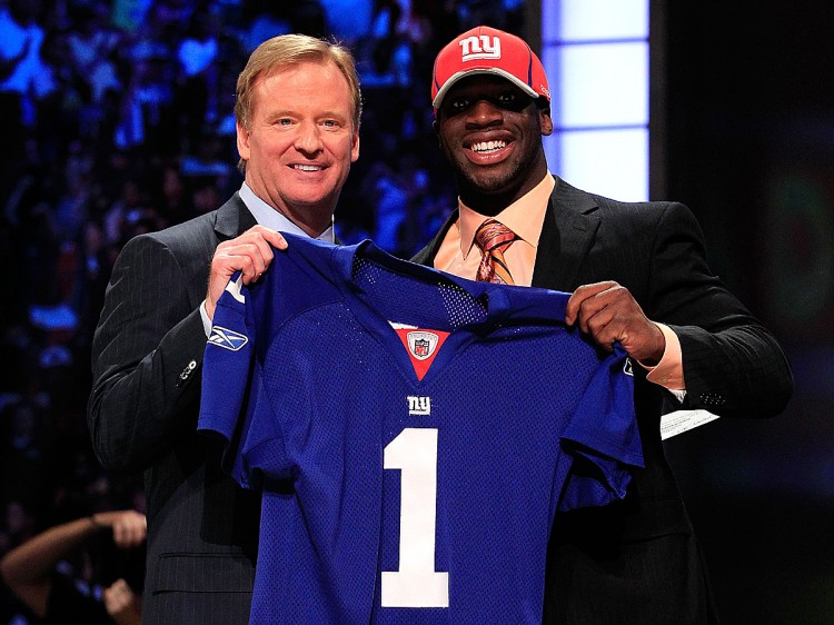 ONE AND DONE: Prince Amukamara poses with NFL Commissioner Roger Goodell at the NFL Draft on April 28 in New York City. The former Husker was the Giants number one draft pick this year, but will miss considerable time after breaking his foot on Saturday. (Chris Trotman)