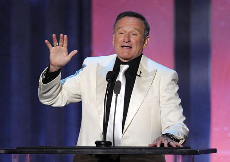 Robin Williams speaks onstage during the 38th AFI Life Achievement Award honoring Mike Nichols on June 10. Williams hopes to play a villain in the newly announced Batman 3 to be directed by Christopher Nolan. (Kevin Winter/Getty Images for AFI)