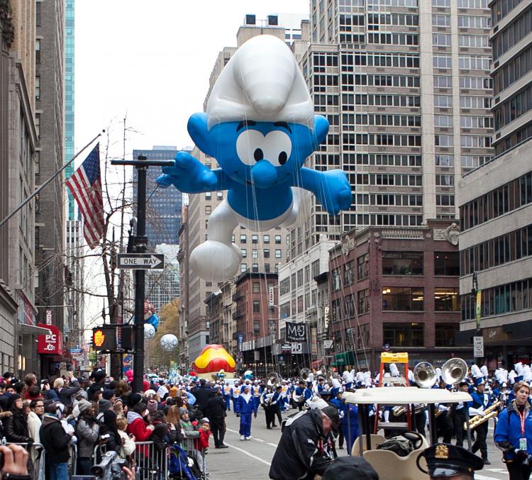 HAPPY SMURF: A giant-sized Smurf makes its way down Broadway on Thursday in the 84th Macy's Thanksgiving Day Parade. (The Epoch Times)