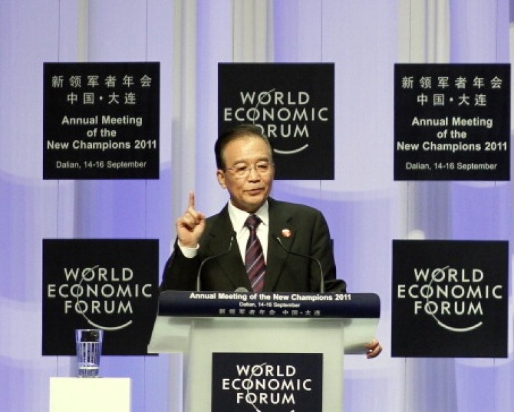 China's Premier Wen Jiabao gestures as he delivers his keynote address at the summer session of the World Economic Forum in the Chinese port city of Dalian, northeast China's Liaoning Province on Sept. 14, 2011. (STR/AFP/Getty Images)